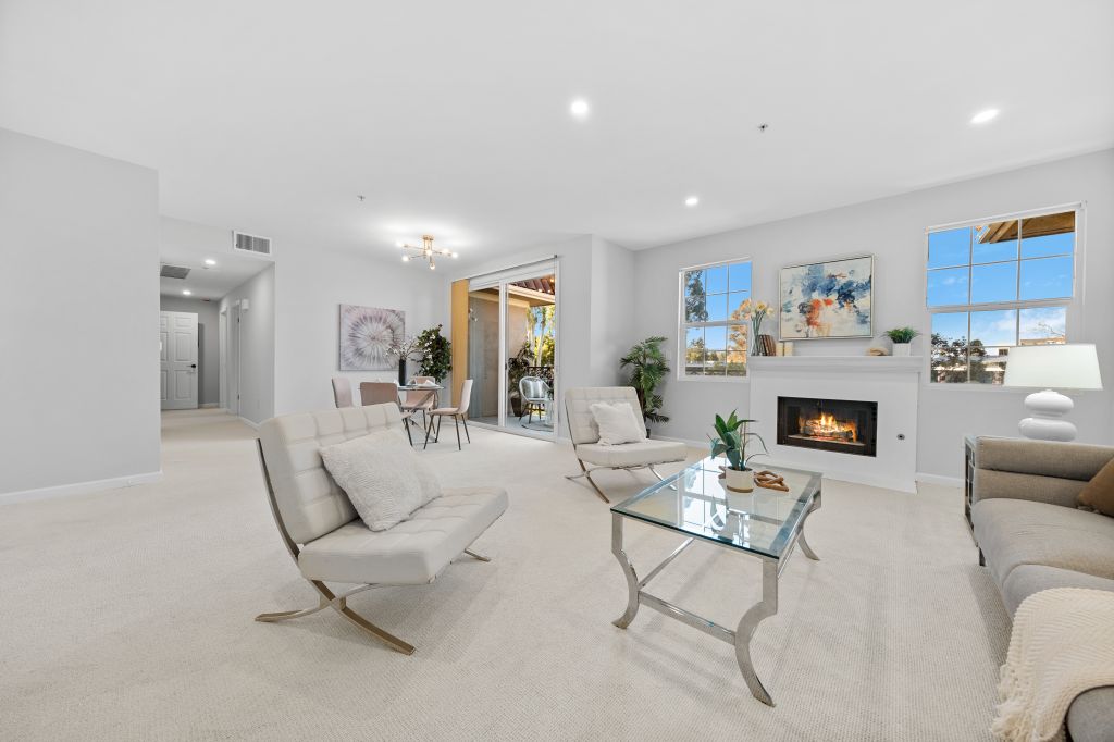Living room with fireplace at 550 El Camino Real Unit 302 in the downtown Burlingame neighborhood in Burlingame.